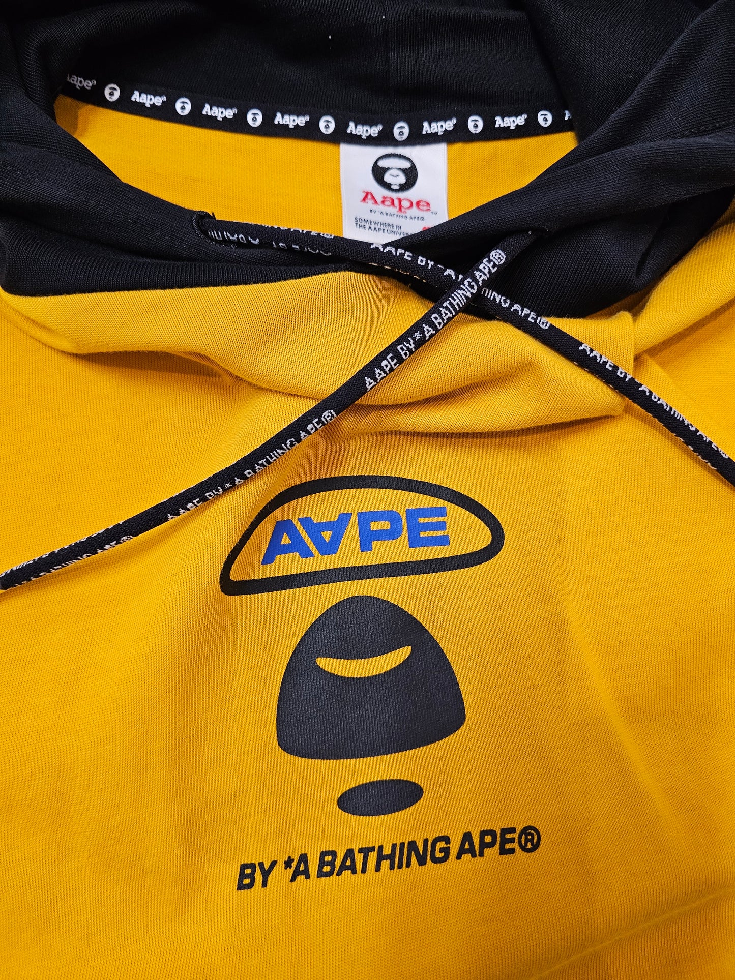 AAPE by Bathing Ape black/yellow  hooded long sleeve