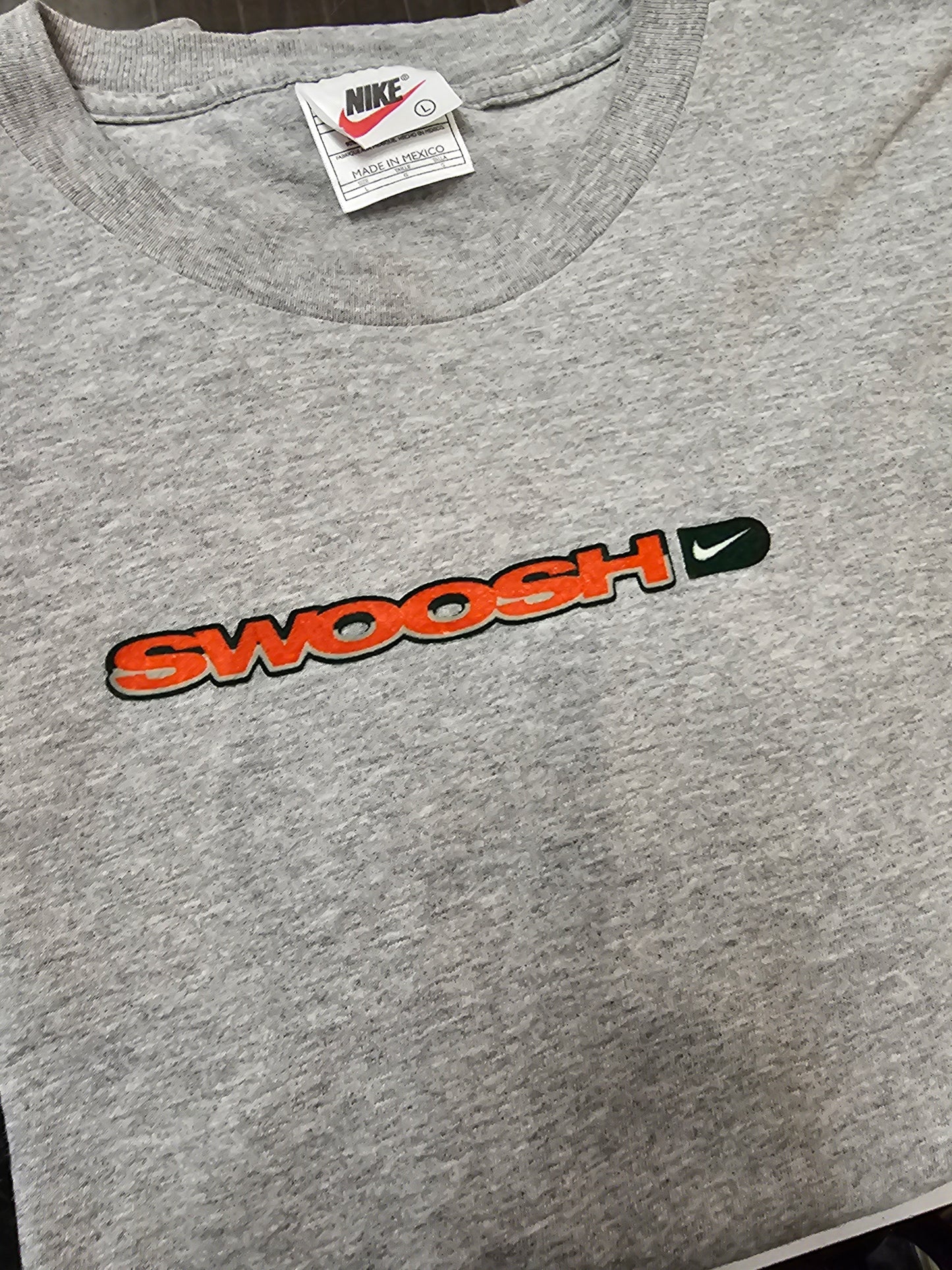 Vintage Nike swoosh grey tshirt