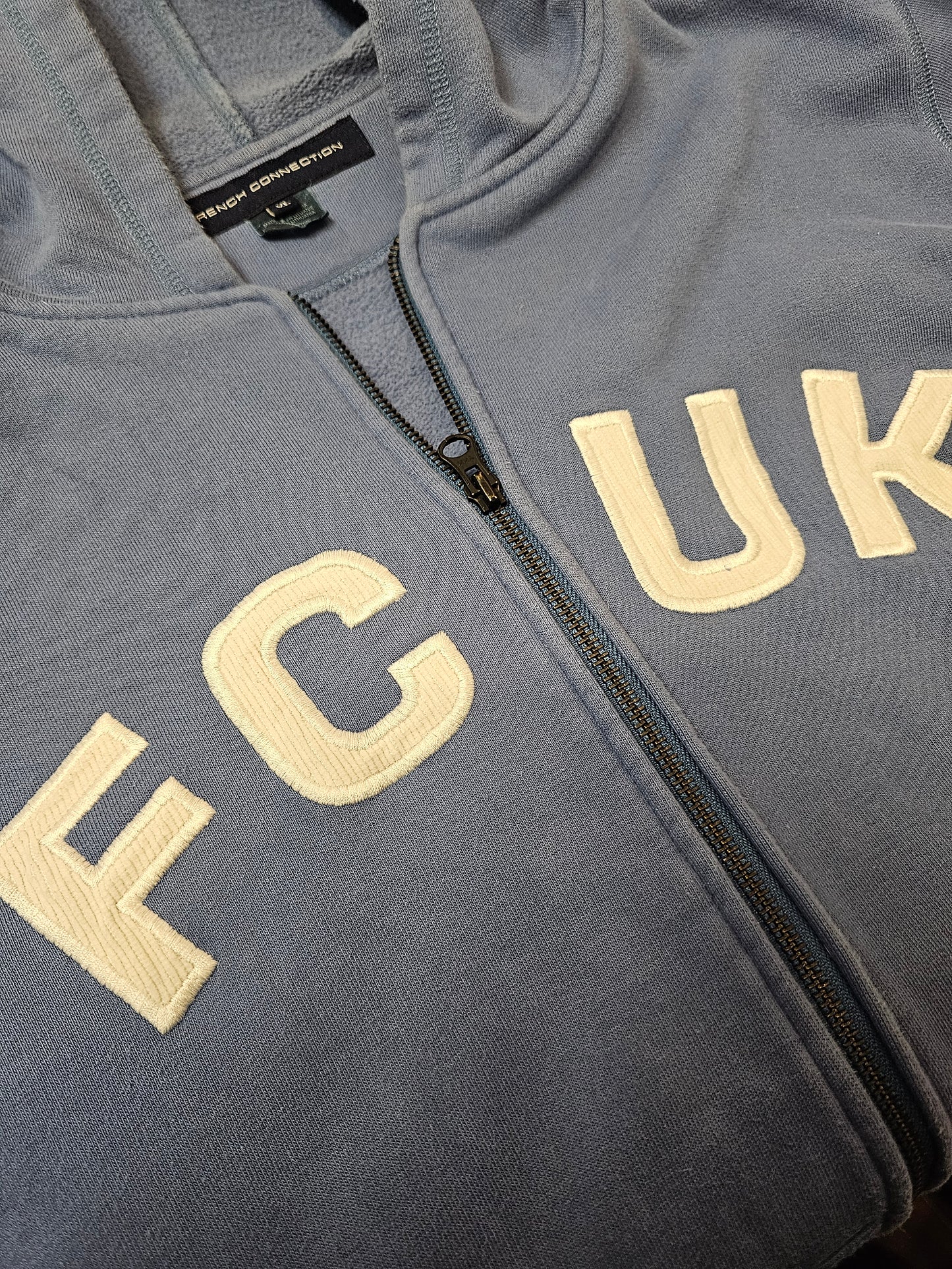 French connection spell out fcuk baby blue zip up hoodie